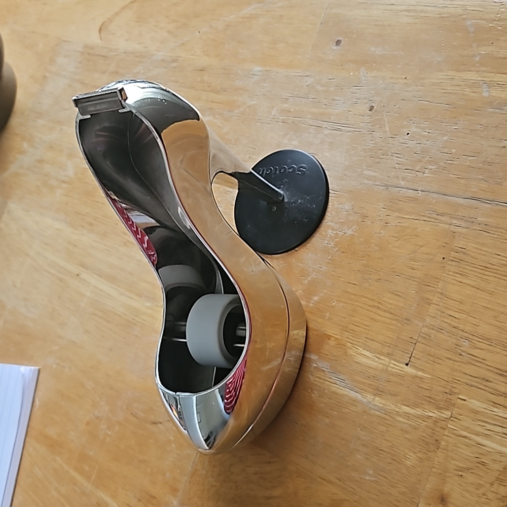 High-heeled scotch tape dispenser